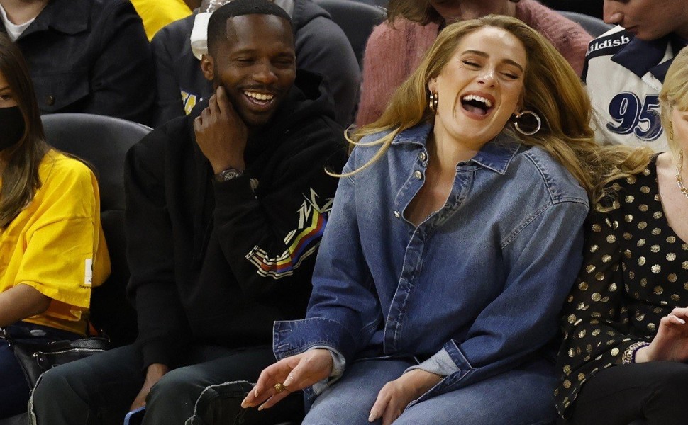 epa09962037 British singer-songwriter Adele (R) and her boyfriend Rich Paul (L) react during the second half of the NBA Playoffs, Western Conference Finals, game two between the Golden State Warriors and the Dallas Mavericks at Chase Center in San Francis