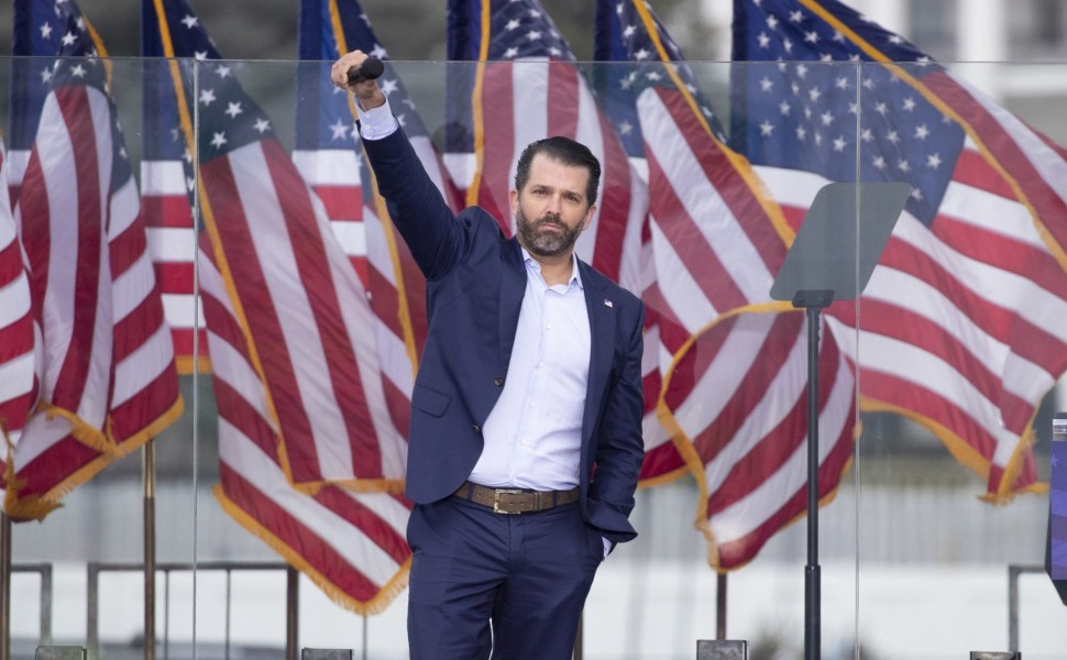 epa08922610 Son of US President Donald J. Trump, Donald Trump Jr., holds up a microphone while delivering remarks at a pro-Trump rally on the Ellipse near the White House in Washington, DC, USA, 06 January 2021. Right-wing conservative groups are protesti