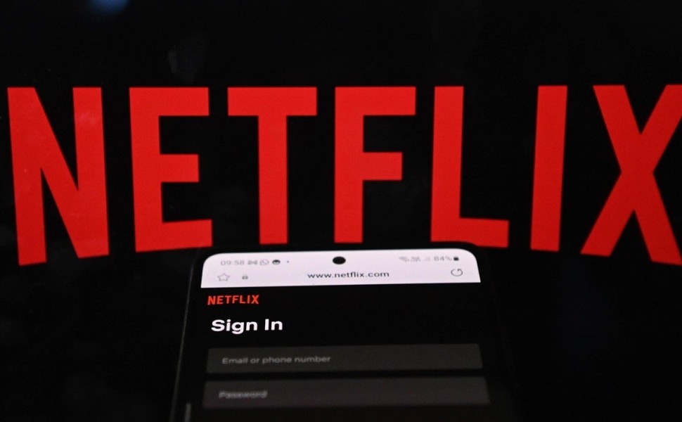 epa10649601 A photo illustration taken 24 May 2023 shows a sign-in screen for the Netflix streaming service. Netflix Inc has expanded its crackdown on password sharing to customers in 103 countries and territories, including the United States, Britain, Fr