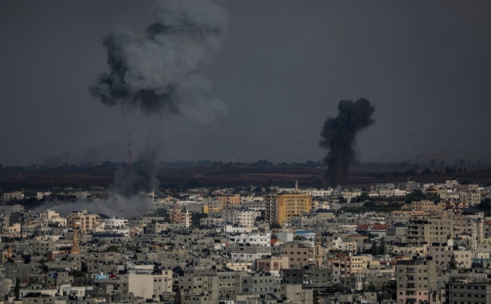 epa10906583 Smoke rises after an Israeli air strike in Gaza City, 07 October 2023. Rocket barrages were launched from the Gaza Strip early 07 October in a surprise attack on Israel claimed by the Islamist movement Hamas. In a televised statement, the Isra