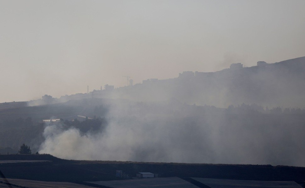 epa07811174 Smoke rises as a result of the shelling on both sides of the border between Israeli and Lebanon, near the Israeli village of Avivim , and in the background the Lebanon village of Maroun Al Ras, 01 September 2019. According to reports, tension 