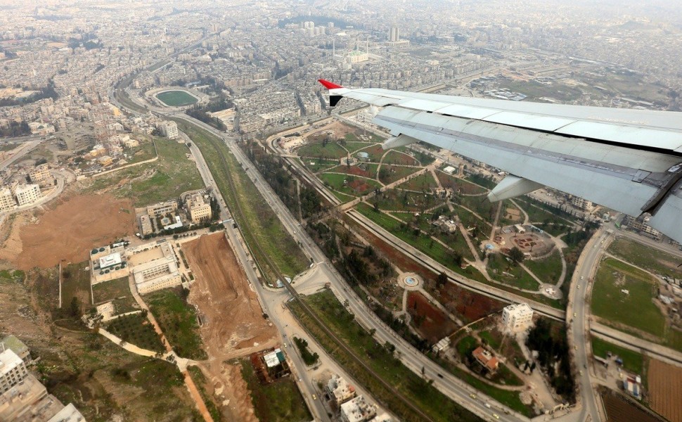 epa08228295 An aerial view taken from a SyrianAir passenger plane over the city of Aleppo, Syria, 19 February 2020. The Syrian government on 19 February organized a tour for reporters in the city of Aleppo after the reopening of the airport and eruption o