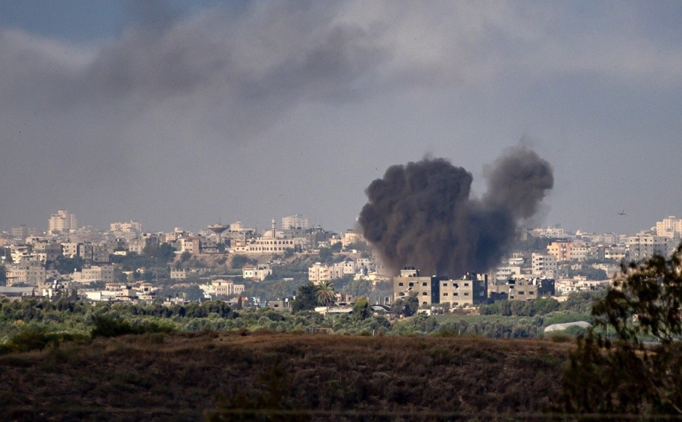 epaselect epa10922915 Smoke rises from the northern part of the Gaza Strip as a result of an Israeli airstrike, 17 October 2023. Israel has warned all citizens of the Gaza strip to move to the south ahead of an expected invasion. More than 2,750 Palestini