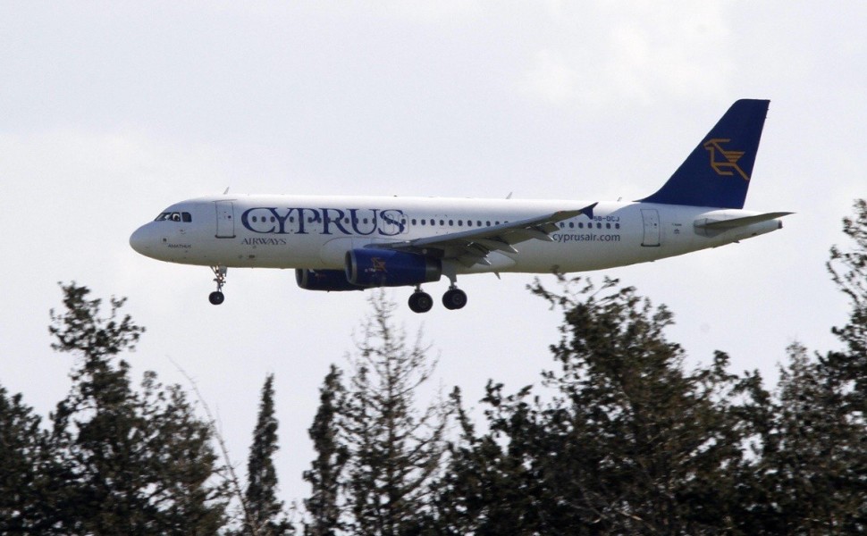 epa04552257 An aircraft of Cyprus Airways seen landing in Larnaca airport, Cyprus, 09 January 2015. The European Commission was due to announce later 09 January whether the carrier was illegally given state aid in 2012 and 2013. If the airline is forced t