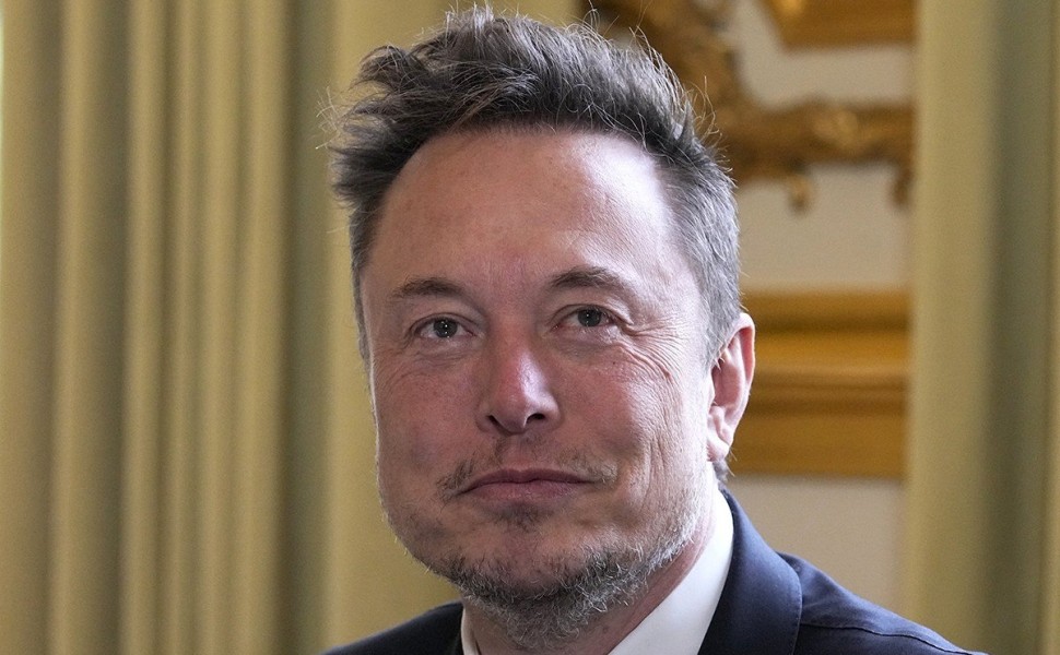 epa10629001 Twitter, now X. Corp, and Tesla CEO Elon Musk poses prior to his talks with French President Emmanuel Macron (not in picture), at the Elysee Palace in Paris, 15 May 2023. More than 200 international business leaders are expected 15 May to atte