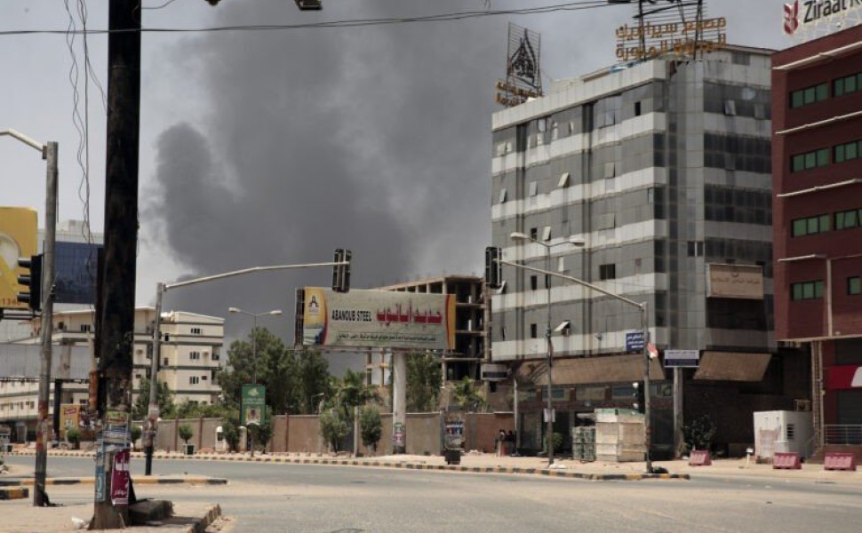 Smoke is seen rising from a neighborhood in Khartoum, Sudan, Saturday, April 15, 2023. Fierce clashes between Sudan's military and the country's powerful paramilitary erupted in the capital and elsewhere in the African nation after weeks of escalating ten