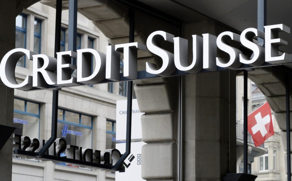 FILE - A logo of Swiss bank Credit Suisse is seen in Zurich, Switzerland, on Aug. 1, 2014. Credit Suisse on Thursday, Feb. 10, 2022 reported a fourth-quarter loss of 2 billion Swiss francs ($2.2 billion) as the top-drawer Swiss bank wrapped up “a year of 