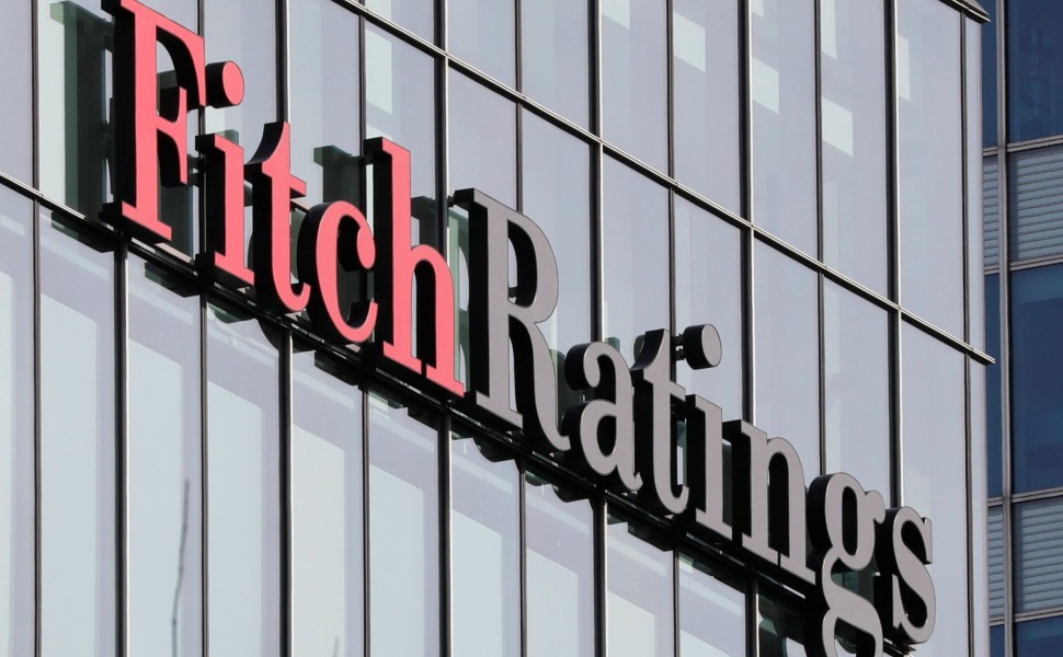 FILE PHOTO: The Fitch Ratings logo is seen at their offices at Canary Wharf financial district in London,Britain, March 3, 2016.  REUTERS/Reinhard Krause/File Photo