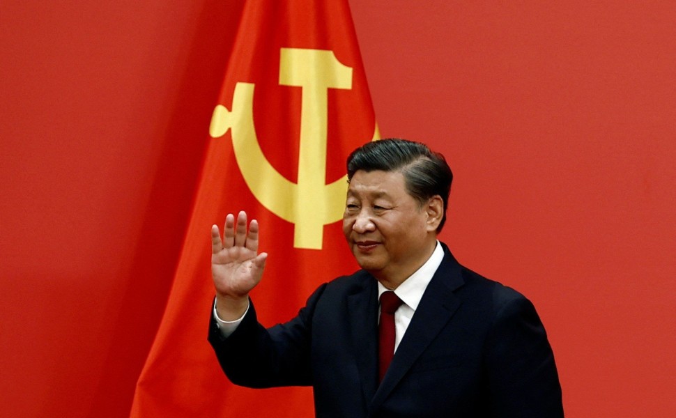 Chinese President Xi Jinping waves after his speech as the new Politburo Standing Committee members meet the media following the 20th National Congress of the Communist Party of China, at the Great Hall of the People in Beijing, China October 23, 2022. RE