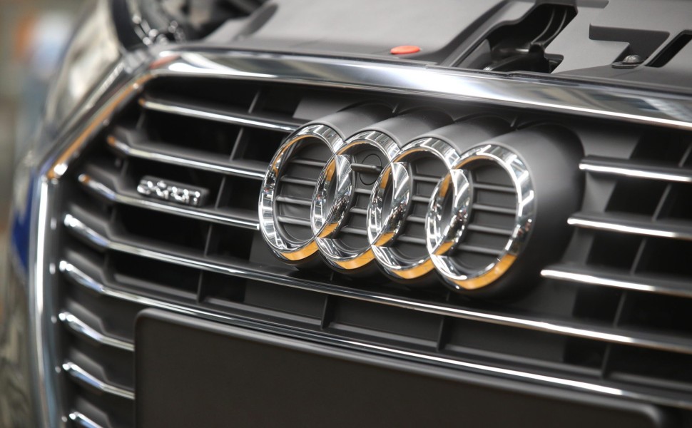 FILE PHOTO: The Audi logo is seen on the car at the production line of the German car manufacturer's plant in Ingolstadt, Germany, March 14, 2018. REUTERS/Michael Dalder