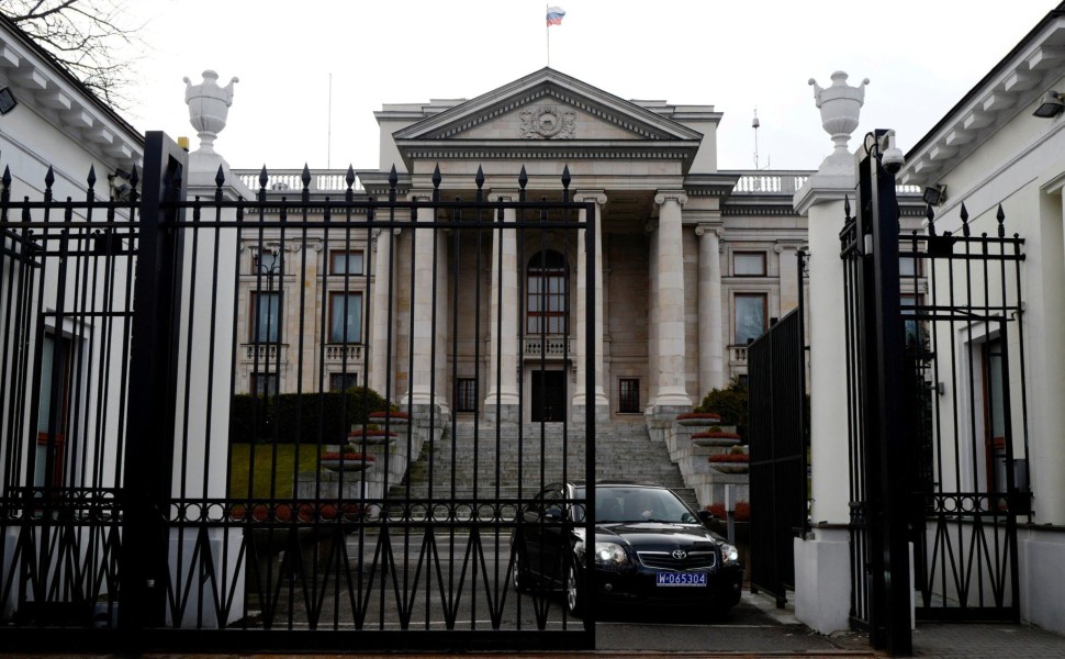 FILE PHOTO: A car leaves through the gate of the Russian embassy building in Warsaw, Poland March 26, 2018. REUTERS/Kacper Pempel/File Photo