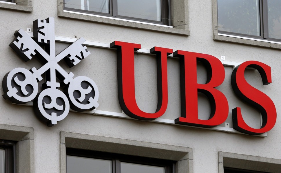 FILE PHOTO: The company's logo is seen at a branch of Swiss bank UBS in Zurich, Switzerland February 2, 2016. REUTERS/Arnd Wiegmann
